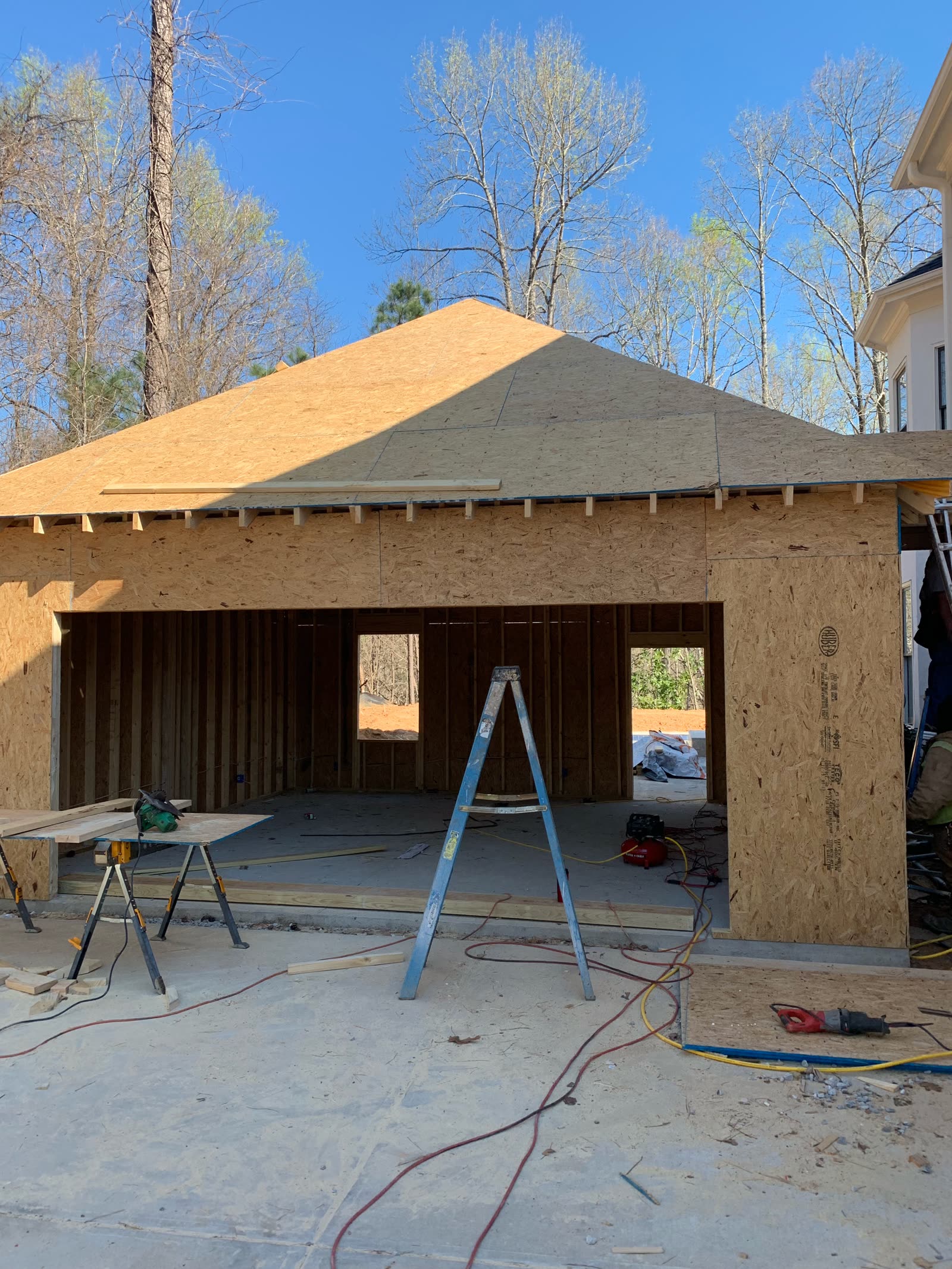 Garage addition fully sheathed, roof sealed
